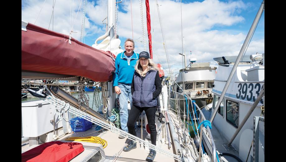 ON DECK – Chuck Shuster and Suze Burd on the deck o f the Tika in Nome’s Small Boat Harbor on Friday, July 17. Photo by Ariana Crockett O'Harra