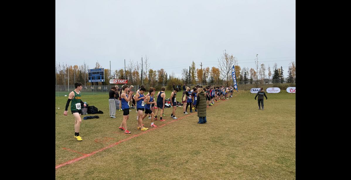 START LINE – Granite Peacock, Gabe Tran and Rowan Moore at the start line of the boys Division II cross country running state championship race on Saturday, October 3 at Bartlett High School in Anchorage. Photo courtesy of Debbie Peacock. Photo courtesy Debbie Peacock