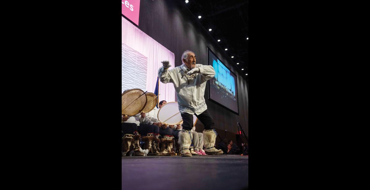 QUYANA NIGHT— Earl Kingik with Tikigaq Traditional Dancers of Point Hope performs onstage during Quyana Night 2 on Friday, October 23. Photo by Ariana Crockett O’Harra