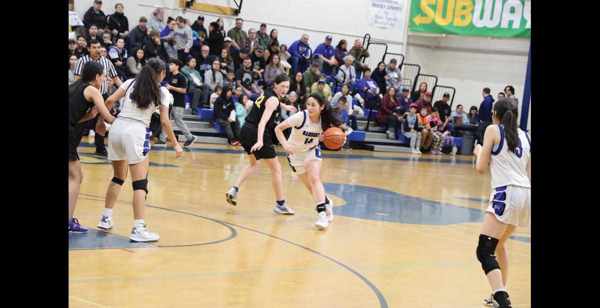 Photo by Anna Lionas Girls MVP of the Subway Showdown Nercyn “Benny” Lie dribbles around Ourea Busk