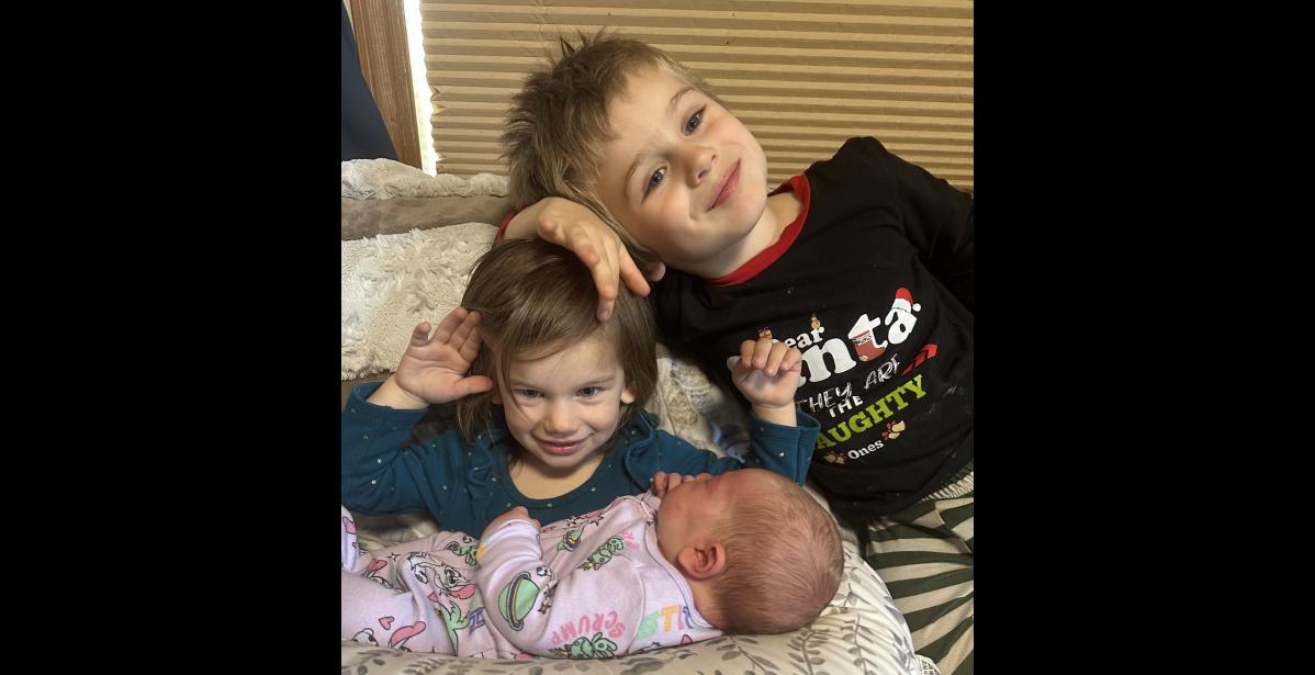 Verena Violet Naaktgeboren is welcomed home by big brother Robert Villella, 5, and big sister Persephone Naaktgeboren, 2.