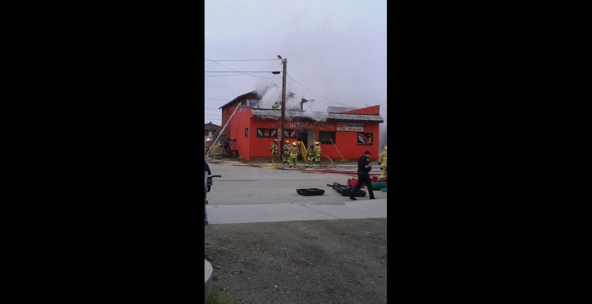 Photo by Denice Gilroy WHERE THERE’S SMOKE—Rapid response and thick sheetrock inside limited loss to mostly smoke damage when Twin Dragon Restaurant caught fire just before midnight Thursday, May 25.