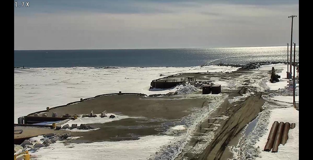 Photo by John Handeland the Port of Nome Causeway juts into open water on April last week.
