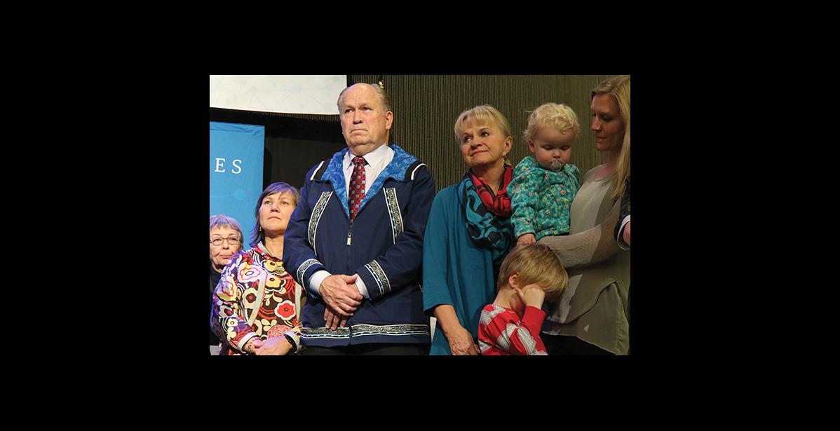 Photo by Julie St. Louis LISTENING— Lt. Gov. Valerie Davidson, Gov. Bill Walker, First Lady Donna Walker and daughter, Lindsay (Walker) Hobson on stage listening to various tribal representatives express their appreciation and sadness at Walker’s announcement.