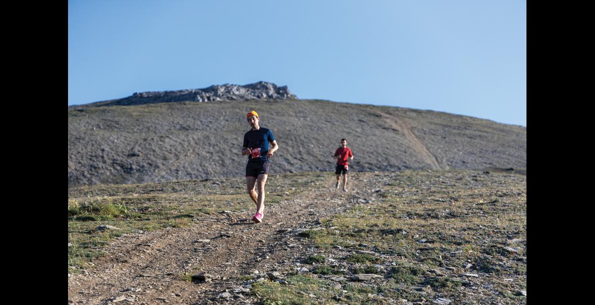 Photo by Laura Robertson DOWNHILL— Andrew Rohrer descends Anvil Mountain during the July 4 Anvil Mountain Run.