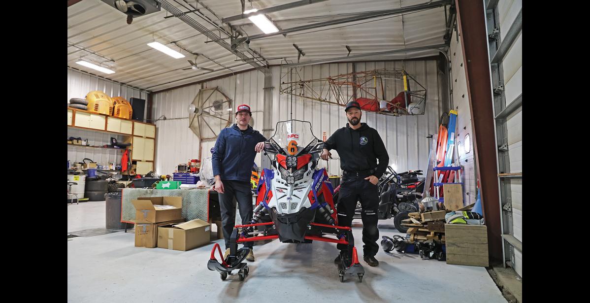 Photo by Megan Gannon READY TO RACE — Nome snowmachine racer Mike Morgan, right, and his new Iron Dog teammate Bradley Kishbaugh are getting ready for the 2,500-mile trek that begins later this month.