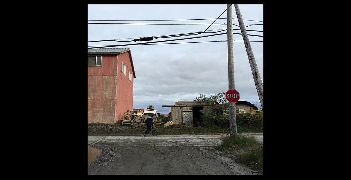 Photo by Sandra Medearis CLEAR THE WAY—The City of Nome has announced an intent to reclaim a Tobuk Alley right-of-way from this point on Steadman Street north of Alaska Cab Garage extending westward to Spokane Street. Abutting property owners must remove encroachments by Sept. 1 or the City’s public works department will remove encroachments and charge property owners.