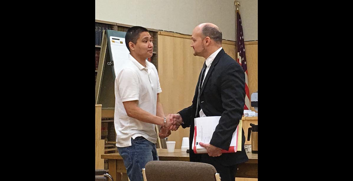 Photo by Sandra Medearis LOOKING GOOD?—Austin Matthias, on trial for raping a man who owed a bootlegger,seems optimistic after his attorney, Matt Tallerico, concludes his closing argument Sept. 12. The next day the jury found Matthias guilty of sexual assaults.
