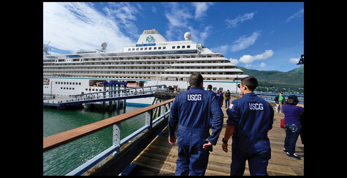 Coast Guard photo by Petty Officer 2nd Class Jon-Paul Rios INSPECTING— Members of Coast Guard Sector Juneau inspections division arrive at the cruise ship Crystal Serenity moored in Juneau, Alaska, to conduct a certificate of compliance exam June 22, 2016. The exam tests the crew’s ability to react in the case of an emergency covering a range of different scenarios.