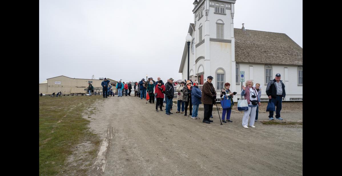 LINING UP – Passengers of the Noordam await rides back to the harbor during the ship’s port of call in Nome on Thursday, June 18. Photo by Ariana Crockett O'Harra