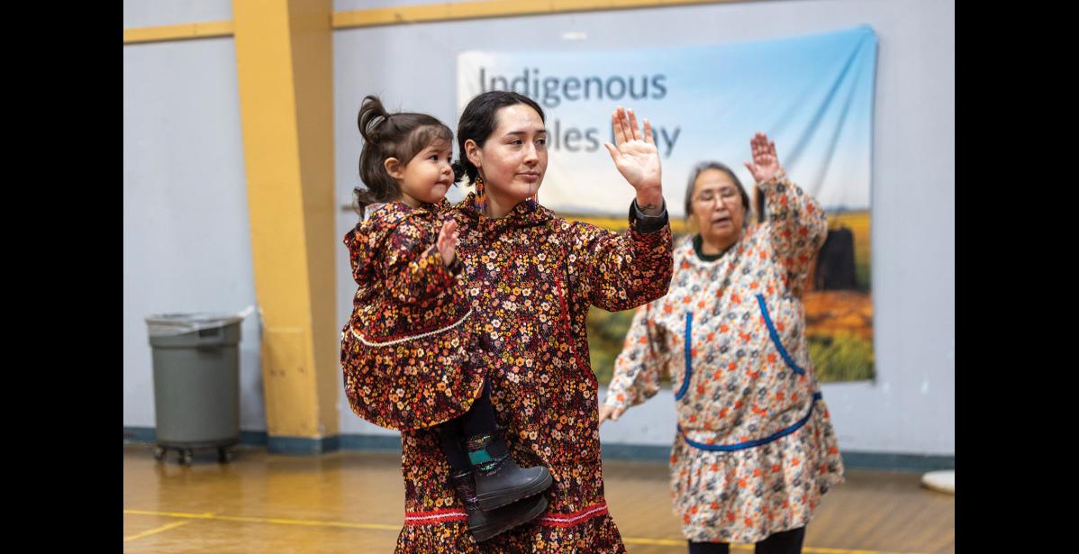 TOGETHER – Kaitlyn Painter and Ilana Sebwenna dance together during Indigenous People’s Day Celebrations at the Nome Rec Center on Monday, October 12. Photo by Ariana Crockett O’Harra