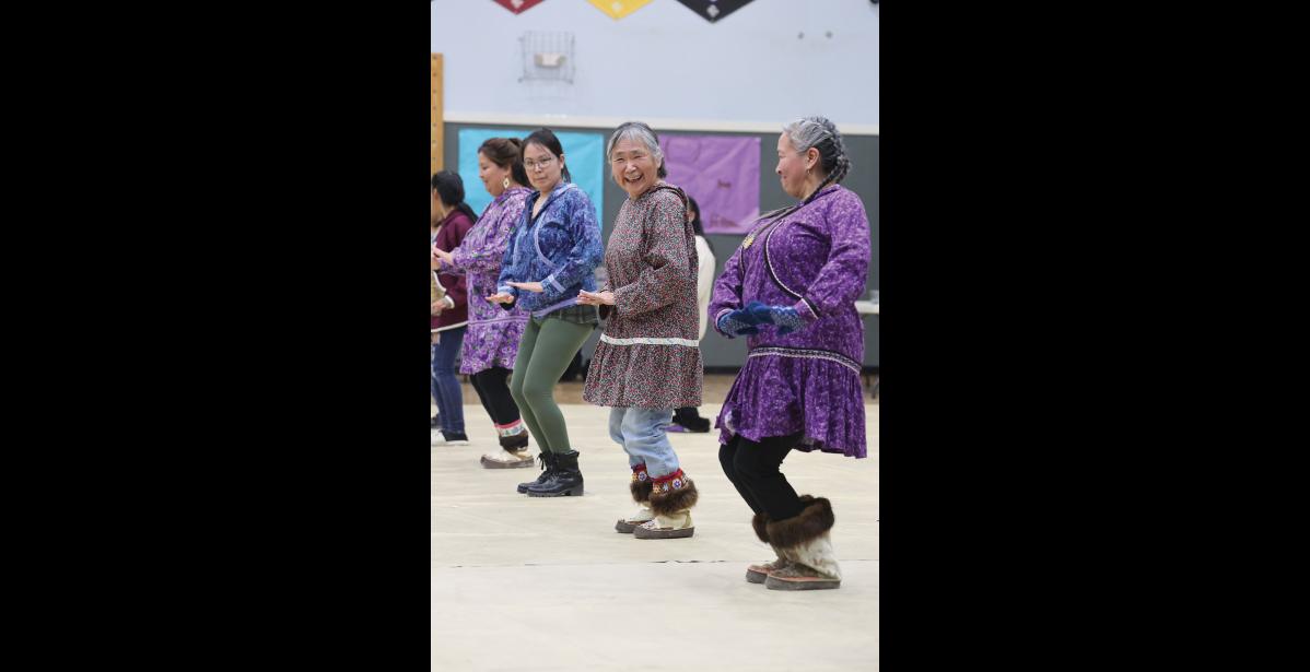 Photo by Diana Haecker TELLER CULTURAL FESTIVAL— Barbara Weyiouanna, center, and Shannon Klescewski, right, share a laugh while dancing on Friday, Sept. 26, at the 19th Teller Cultural Festival.