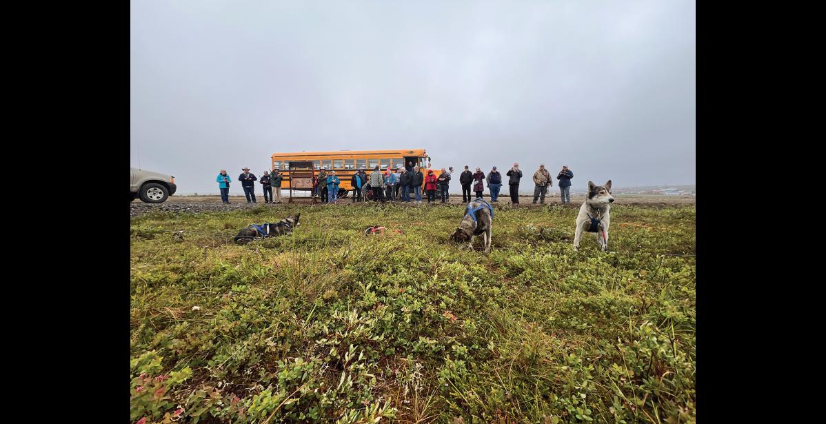 SLED DOGS— Visitors heard tales from the trail from Nome musher and Iditarod finisher Nils Hahn. Photo by Diana Haecker