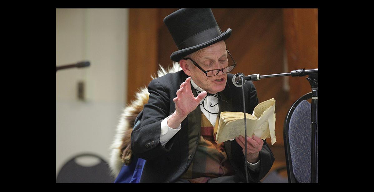 Photo by Diana Haecker ROBERT SERVICE READING— It was tradition that Richard Beneville held Robert Service readings during Iditarod time at the Mini Convention Center.