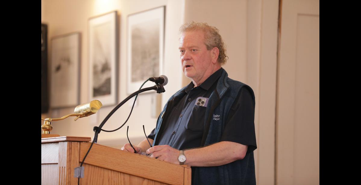 Photo by Diana Haecker Nome Mayor John Handeland gives introductory remarks during Friday, April 18, City of Nome Investment Summit at Old St. Joe's.