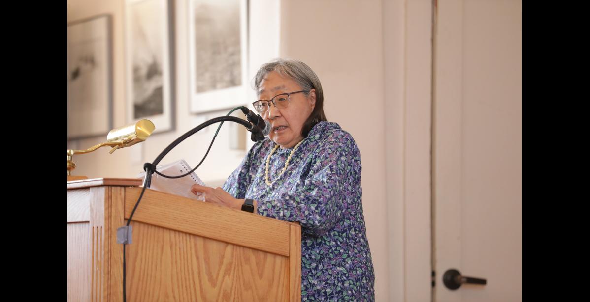 Photo by Diana Haecker Marilyn Koezuna-Irelan addresses the audience at the Investment Summit.