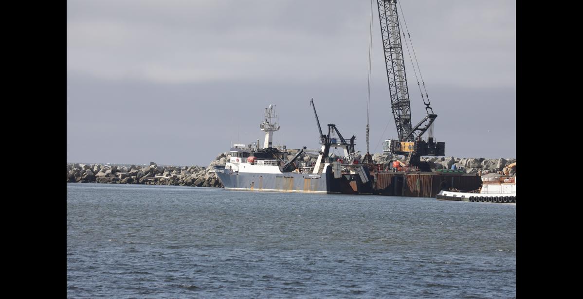 The Coast Guard then coordinated the rescue of the survivor with the Northwest Explorer, a nearby good Samaritan vessel. The vessel took the survivor and the bodies of the two mariners to Nome. Photo by Diana Haecker