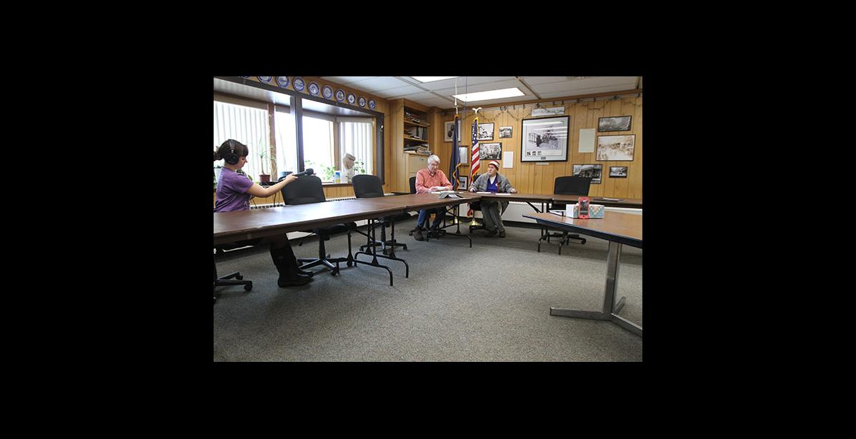 Photo by Diana Haecker City Manager Glenn Steckman and Mayor Richard Beneville hold a press conference on Monday. KNOM's Emily Hofstaedter records.