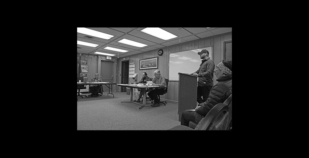 Photo by Diana Haecker PUBLIC COMMENT— Acting Mayor Jerald Brown, left, City Clerk Bryant Hammond, City Manager Glenn Steckman, center, listen to Port Commissioner Derek McLarty at the podium.