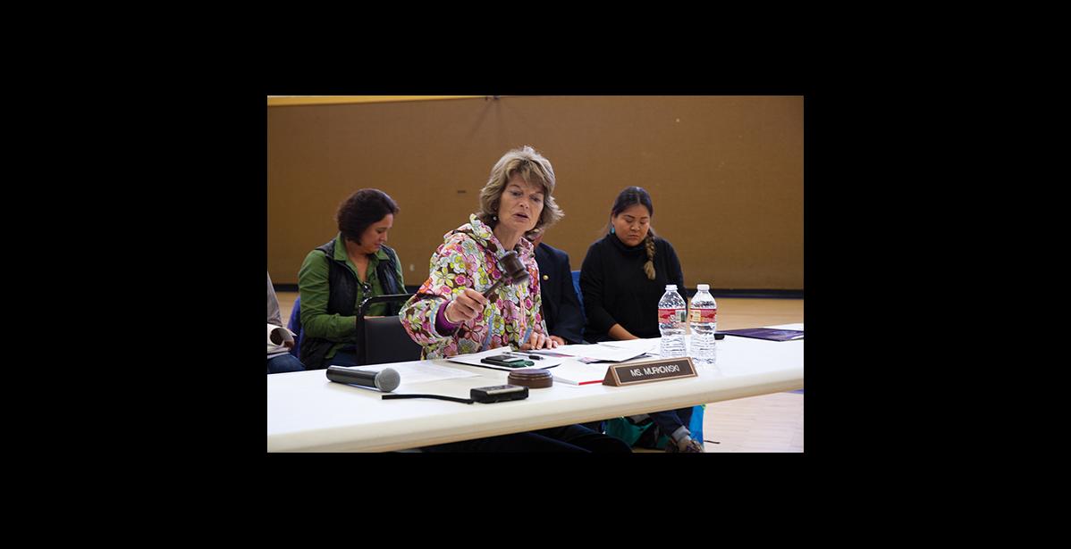 File photo by James Mason IN SESSION – With a bang of the gavel Senator Lisa Murkowski calls into session a field hearing of the Senate Indian Affairs Committee in Savoonga, August 2018.