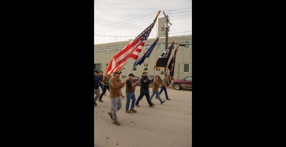 Photo by James Mason MEMORIAL DAY – Veterans begin the march down Nome’s Front Street on their way to the Nome cemetery for a commemoration of Memorial Day Monday