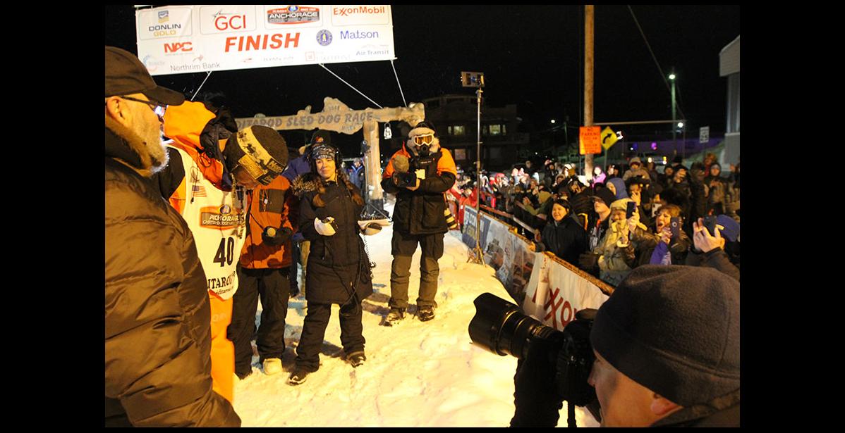 Photo by Diana Haecker Instead of diving into the crowd, Thomas Waerner practices social distancing at the finish line, and bows to the wellwishers at the finish chute.