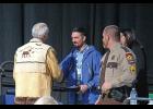 Photo by Julie St. Louis KEY NOTE— Pete Kaiser, 2019 Iditarod champion, receives gifts from Alaska Federation of Natives Co-chairman Will Mayo after his keynote address.