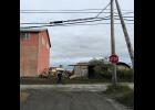Photo by Sandra Medearis CLEAR THE WAY—The City of Nome has announced an intent to reclaim a Tobuk Alley right-of-way from this point on Steadman Street north of Alaska Cab Garage extending westward to Spokane Street. Abutting property owners must remove encroachments by Sept. 1 or the City’s public works department will remove encroachments and charge property owners.