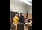 Photo by Sandra Medearis SENTENCING— Frank D. Lee, left, and his defense attorney converse after Lee was sentenced to 80 years for the killing of William Johnson.