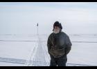 Photo by Ariana Crockett O’Harra Keith Andrews on the way to visit his sculpture on the sea ice in front of Nome.