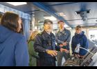 ON THE BRIDGE— First Officer of the Oshoro Maru Naoki Hoshi gives a tour of the bridge to visitors on July 10. Photo by Ariana Crockett O'Harra