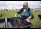 PANNING FOR GOLD – Sue Schuble of Springfield, Missouri, pans for gold at Anvil City Square on Thursday, August 20. Photo by Ariana Crockett O'Harra