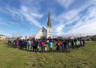 Photo by Derek Martin WALK FOR ASHLEY— Nome residents gathered to stand in solidarity with missing 10-year-old Ashley Johnson-Barr from Kotzebue, on Thursday. The body of the girl was found the next day near Kotzebue.