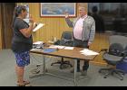 Photo by Diana Haecker SWORN IN— Interim Mayor John Handeland takes the oath of office, on Tuesday, June 30.