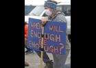 Photo by Diana Haecker ENOUGH IS ENOUGH— Ian McRae kneels while the Black Lives Matter demonstration asked participants to kneel and observe a moment of silence for victims of police brutality.