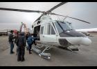 Photo by James Mason ALL ABOARD— Passengers for Diomede board the Pathfinder helicopter on Monday, Oct. 22 at the Nome Airport.