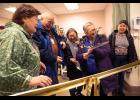 Photo by James Mason BIG SCISSORS – NSHC board member Alice Fitka wields the big scissors to cut the ceremonial ribbon at the dedication of the hospital’s new MRI machine. From left are Berda Willson, Native Village of Council; Alfred Sahlin of Nome Eskimo Community; Jean Ferris of Stebbins; Alice Fitka of St. Michael and Mathilda Hardy, Native Village of Shaktoolik.