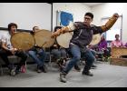 Photo by James Mason CELEBRATING—Eddie Kakaruk with the King Island drummers and dancers helped celebrate the commemoration of new UAF Northwest Campus buildings.