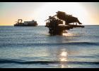 HAULING OUT— The Tagiuk Provider is at anchor and the crawler is making its way out to attach a tow line. 