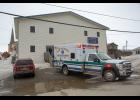 Photo by James Mason FIRST RESPONSE –– A Nome ambulance responds to the NEST shelter to take care of a man who'd fallen and was bleeding. The Nome Emergency Shelter Team, NEST for short, offers shelter at night from November through April. This week, it closed for the season.