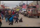 Photo by James Mason FOURTH OF JULY PARADE – Kids scramble for candy as the floats drift by during Nome’s Fourth of July parade.