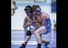 Photo by James Mason OUTSTANDING WRESTLER—Elden Cross wrestles his Kotzebue opponent in the 145-lbs championship match Saturday, which he won, during the Regional Wrestling Tournament, held in Nome last weekend. Cross was named Outstanding Wrestler.