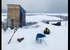 Photo courtesy of Philip Rode EARLY— Unseasonally early sea ice breakup caused a hectic effort to salvage mining equipment from mining operations in front of Nome