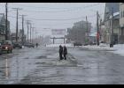 Nome's Front Street is nearly empty, on Friday afternoon, when in "normal" years many visitors stroll down Front Street. 